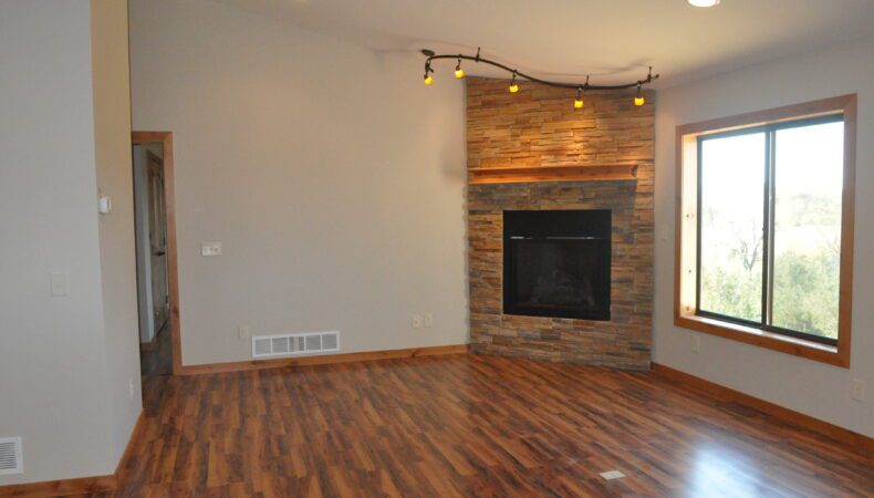 Interior of home showing fireplace and mantel.