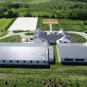 View of the roofs of large equestrian buildings.