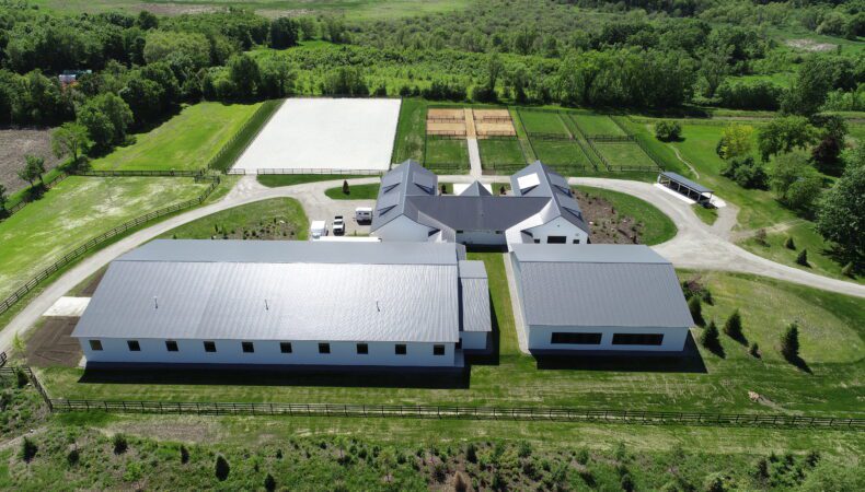 View of the roofs of large equestrian buildings.
