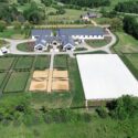 Back side of property from drone including fenced areas.