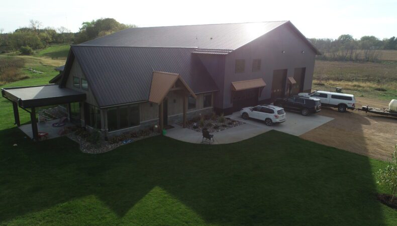 Parking area of home with several vehicles parked outside