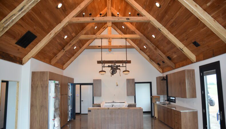 Interior view of kitchen with large vaulted ceiling