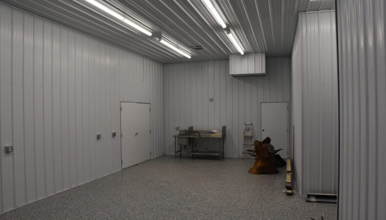 Inside of garage space with sink.