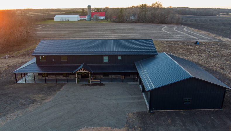 Front view of home with large garage to the right