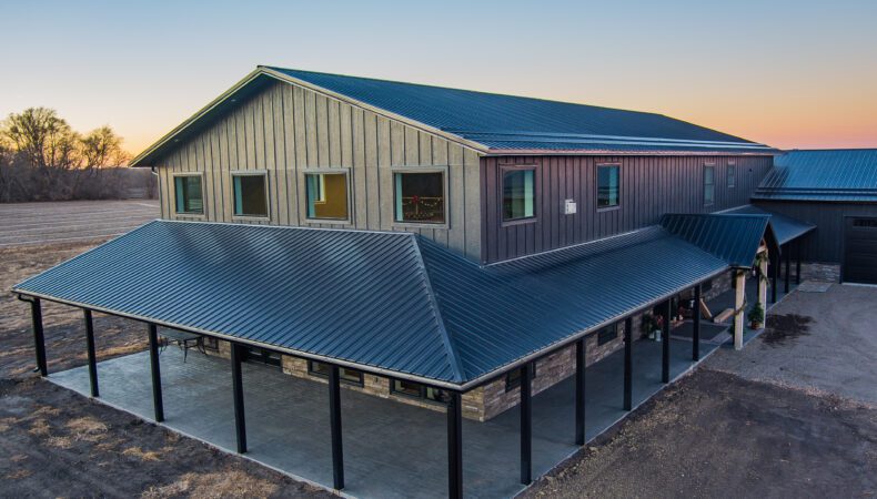 View of front left of the building, showing large wrap around covered patio