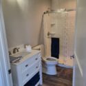Small 3/4 bathroom.