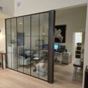Office area with glass divider wall