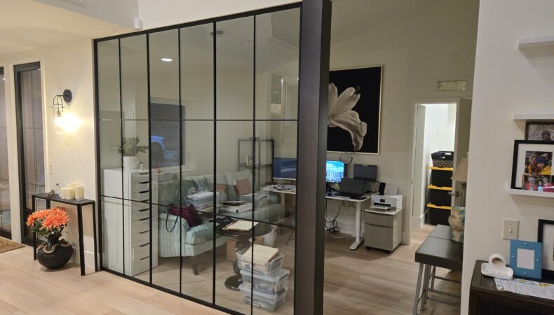 Office area with glass divider wall