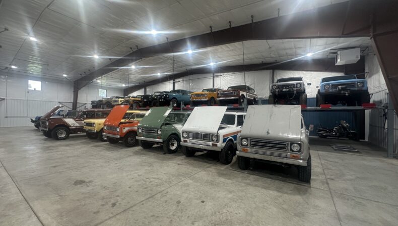 Garage space with several vehicles in storage