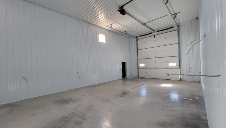 Single stall vehicle/storage area.