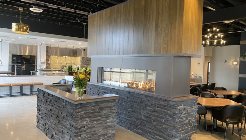 Right view of front of house area and fireplace