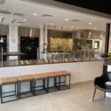 Open kitchen and prep area of restaurant