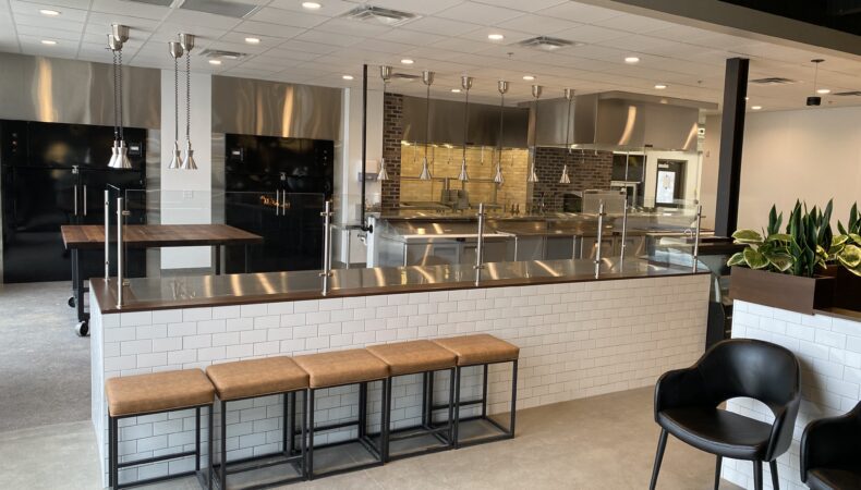 Open kitchen and prep area of restaurant