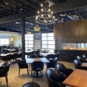 Sitting area in restaurant with feature fireplace