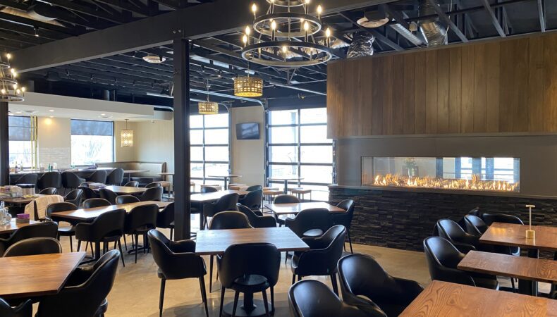 Sitting area in restaurant with feature fireplace