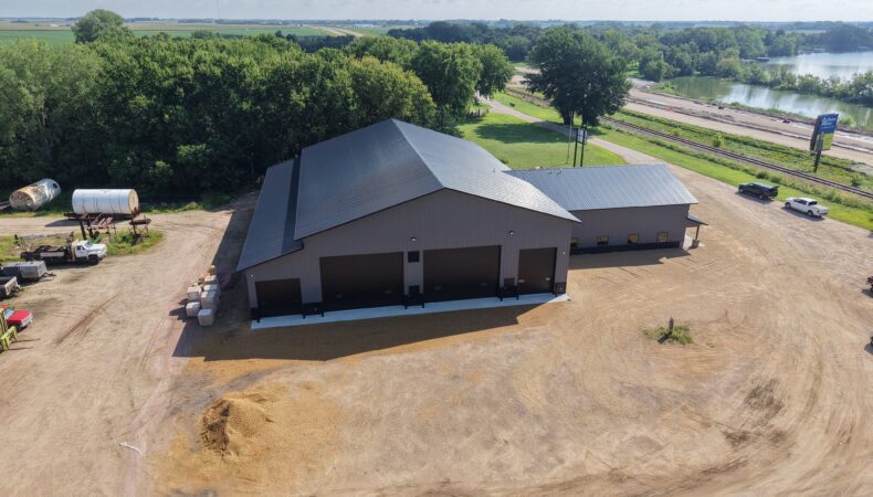 Left side of building with large garage doors