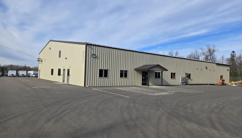 Front of building from large parking lot