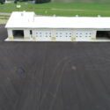 Large building with 5 large garage doors.