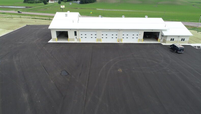 Large building with 5 large garage doors.