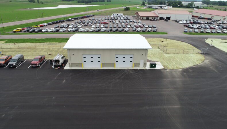 Smaller vehicle storage building with 2 garage doors.