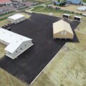 Aerial look at full MnDOT Courtland Truck Station property with 3 buildings.