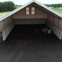 View of front of hangar type building