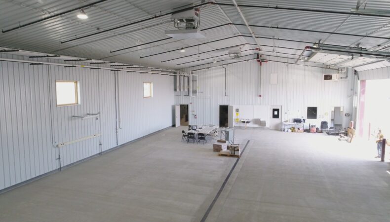 Interior of truck station building with white walls and ceiling