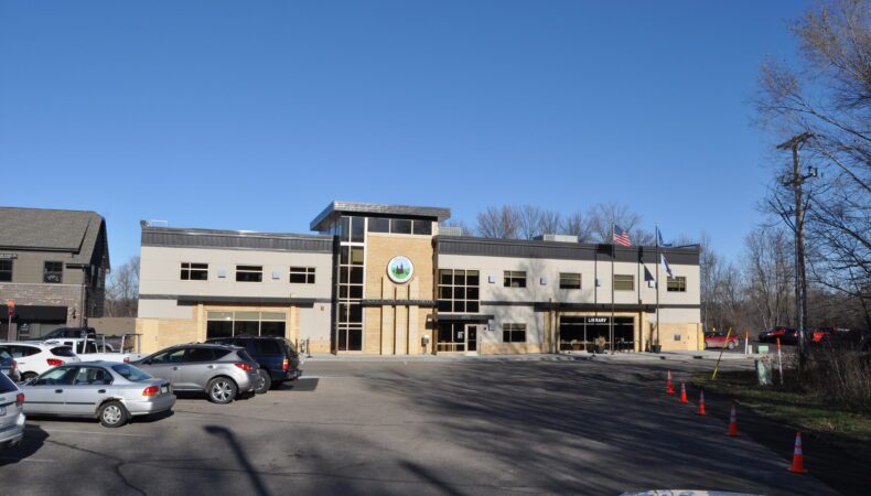 Full view of Victoria City Hall & Library building from parking lot.