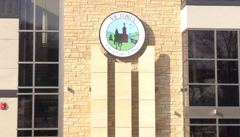 Exterior view featured Victoria City Hall & Library sign.