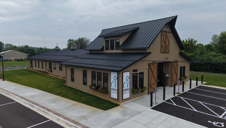 Left side of front of building with signs.