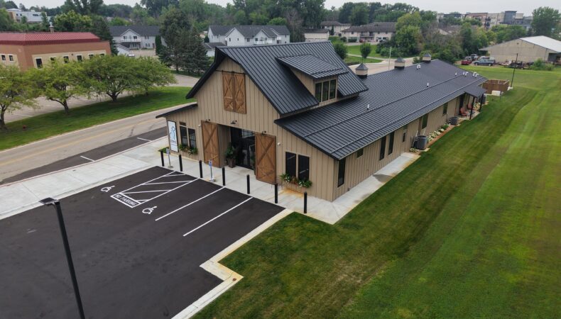 Right side aerial view of front of building