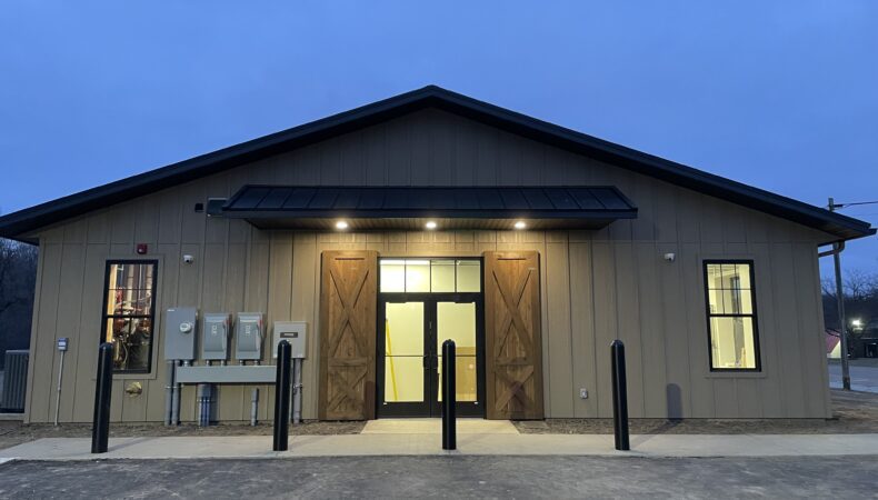 Back entrance of building from parking lot.