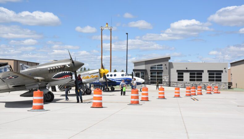 Historical airplanes in front of airport